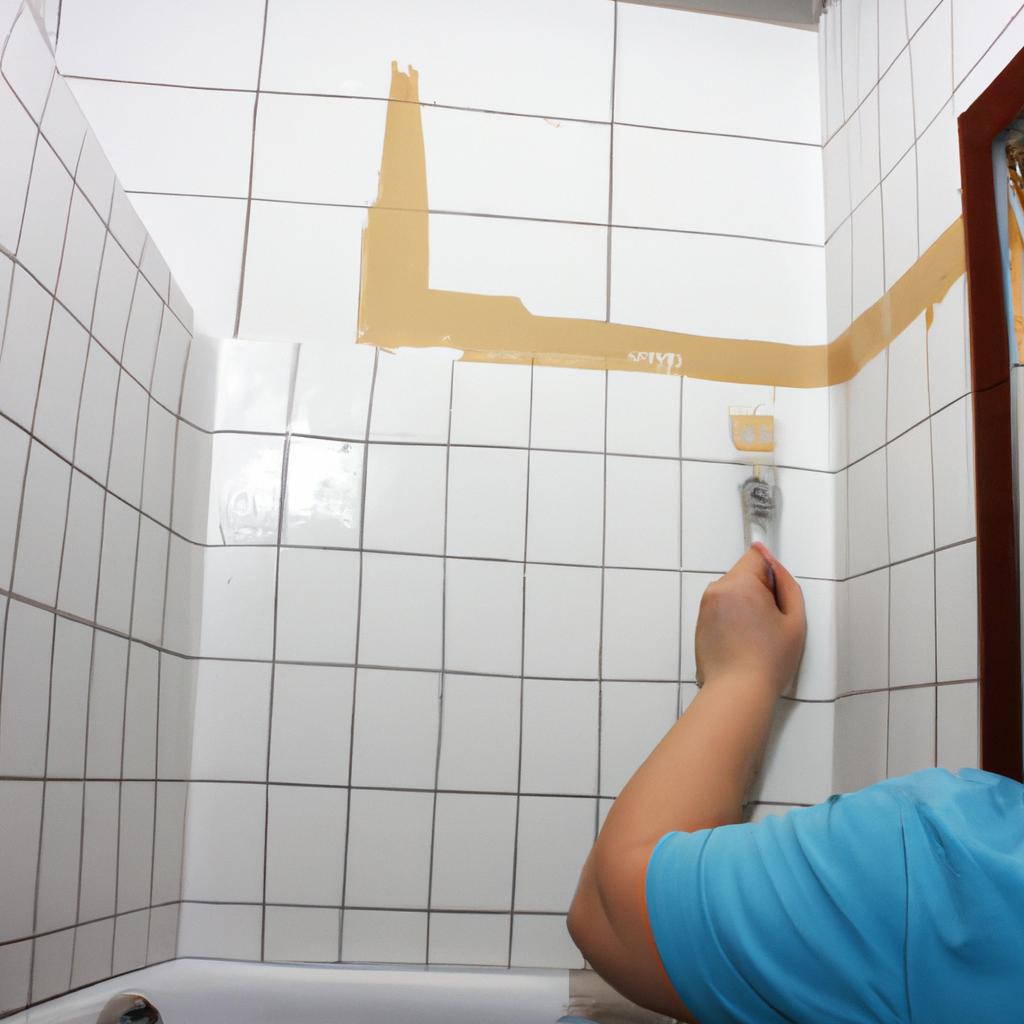 Person painting bathroom walls
